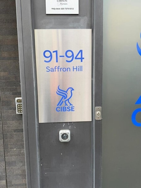 An image of the blue and silver Saffron Hill wayfinding signage.